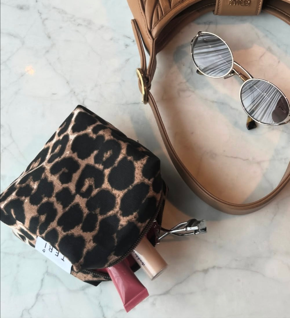 Micro leopard vanity bag