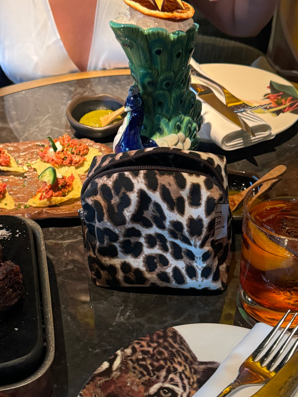 Micro leopard vanity bag