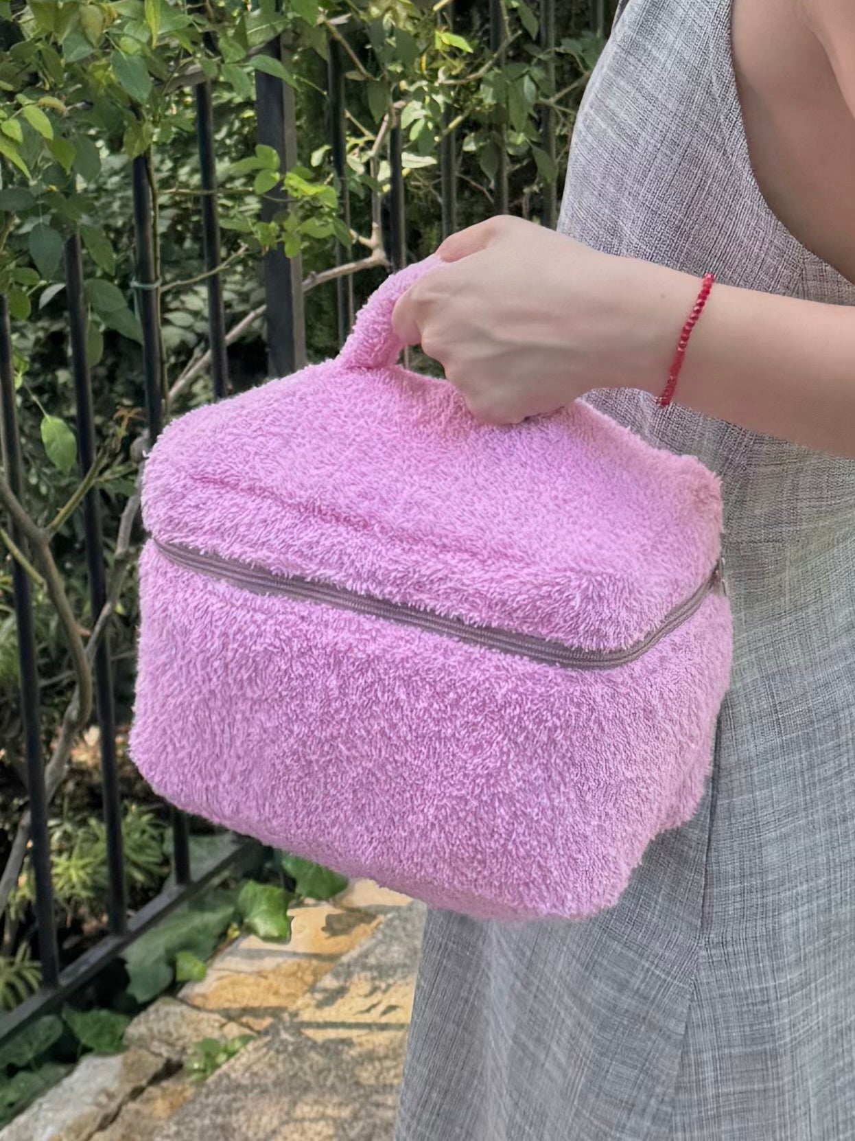 Roze frotirni koferčić