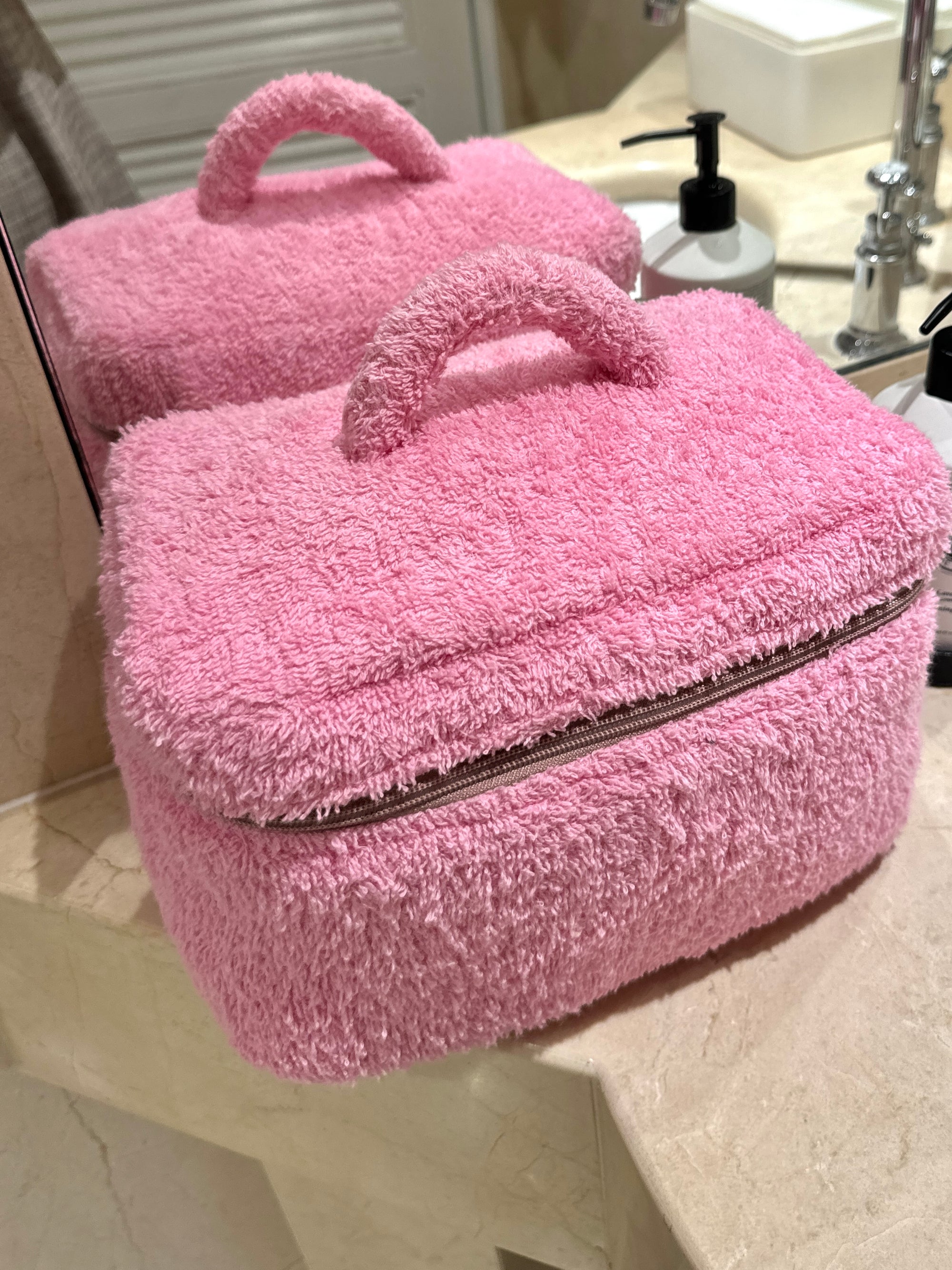 Roze frotirni koferčić