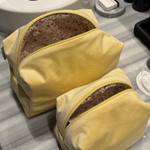 Butter yellow neseser