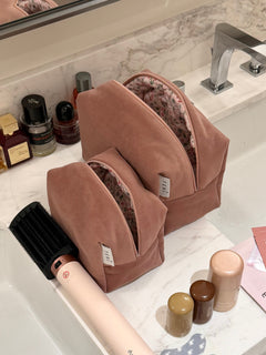 Soft pink velvet vanity bag