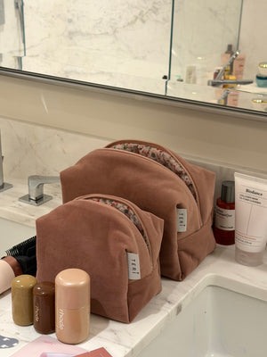 Soft pink velvet vanity bag