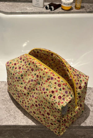 Yellow floral vanity bag
